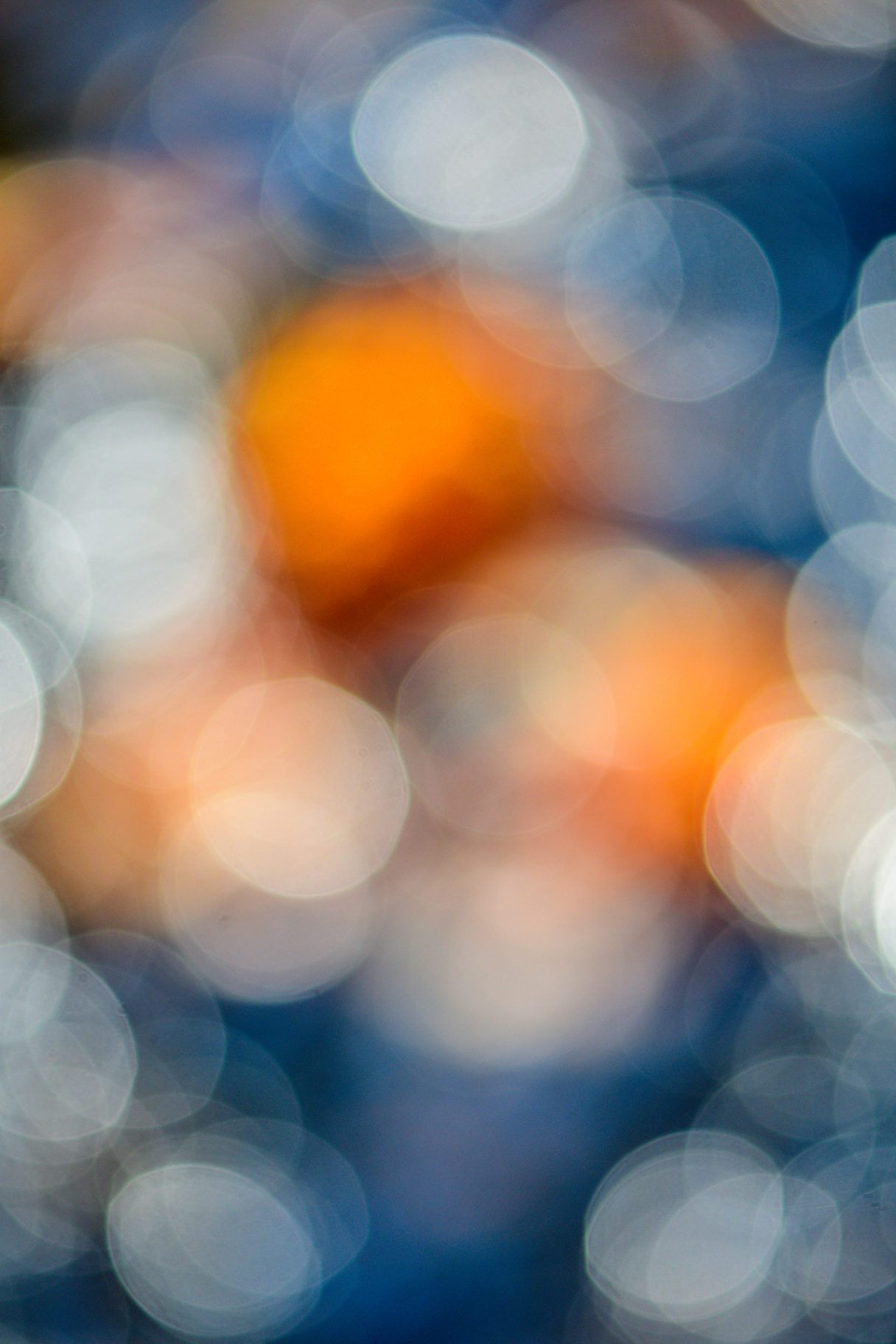 Soft bokeh of blue and warm orange light